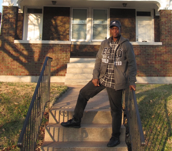 Mike stands in front of the FOCUS Men's House